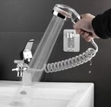 Univerzální sprchová souprava s vodním filtrem se spirálovou hadicí na vodovodní baterii